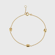 gold triple shell bracelet