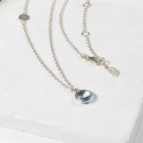 Salina Blue Topaz and Sterling Silver Disc Necklace